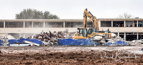 Picking up lunchroom remains