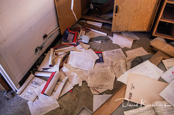Papers on Chemistry room floor