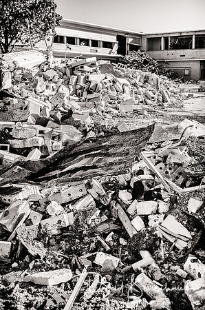 Debris in cafeteria in courtyard behind school