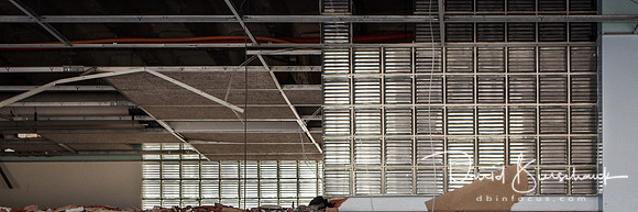 Glass blocks the lined the walls in the North hallway above the lockers